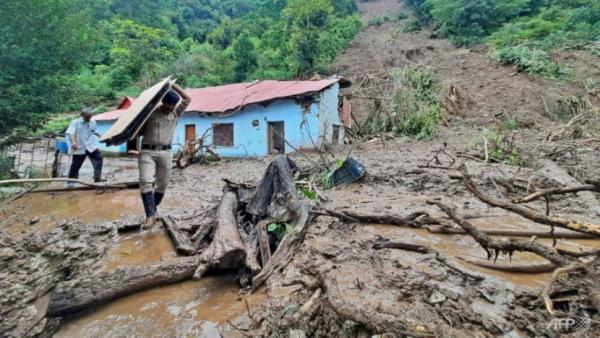 Search for survivors after Indian floods, landslides kill 65