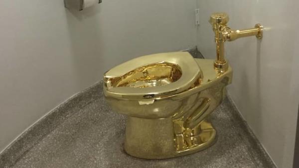 Four men charged with theft of US$6 million gold toilet from UK palace