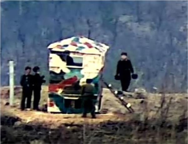 North Korean soldiers are spotted near a guard post inside of the Demilitarized Zone separating the two Koreas in this photo provided by the South Korean defense ministry on Nov. 27, 2023. (PHOTO NOT FOR SALE) (Yonhap)