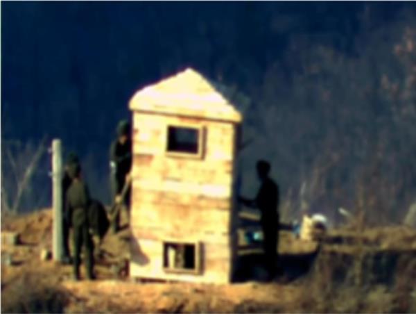 North Korean soldiers are spotted near a guard post inside of the Demilitarized Zone separating the two Koreas in this photo provided by the South Korean defense ministry on Nov. 27, 2023. (PHOTO NOT FOR SALE) (Yonhap)