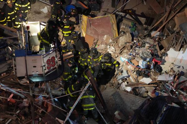 FDNY search the rubble for potential victims.