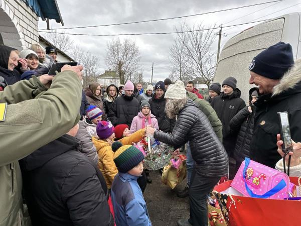 Denise Brown (centre), UN Resident Coordinator in Ukraine, visits Hroza, wher<em></em>e a Russian strike killed 59 civilians as they gathered at a cafe on 5 October 2023.