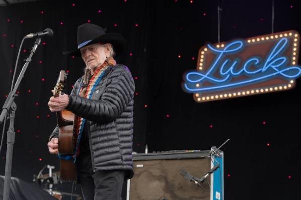 Willie Nelson isn't planning on putting down his guitar anytime soon. Credit: Getty Images/ Jim Bennett/ WireImage