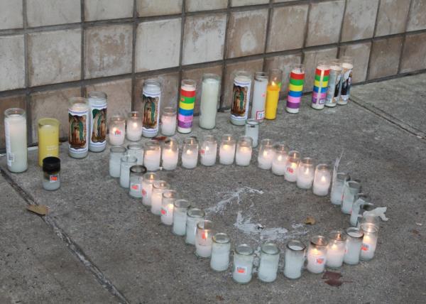 A candle memorial was placed in the Flatiron District crime scene wher<em></em>e college student Denzel Bimpey, 18, of the Bronx, died.