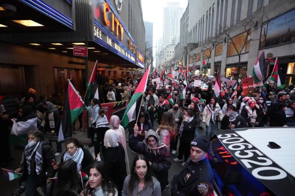 Pro-Palestinian protestors outside of Radio City Music Hall on Dec. 25, 2023.