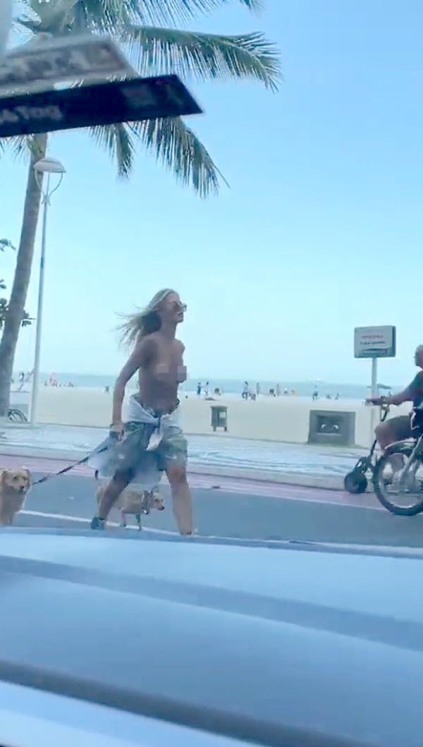 Caroline Werner walking dogs topless 