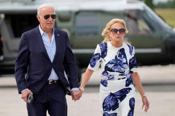 President Joe Biden, left, and first lady Jill Biden arrive on Marine One at East Hampton Airport, Saturday, June 29, 2024, in East Hampton, N.Y. 