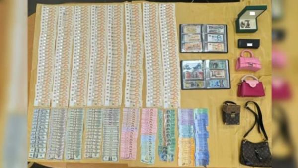 Two men arrested for housebreaking with over S$100,000 in cash and valuables stolen