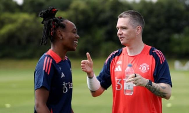 Melvine Malard talks with Marc Skinner during a training session at St Georges Park this week.