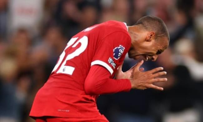 Joel Matip of Liverpool reacts after scoring an own goal at Tottenham last September