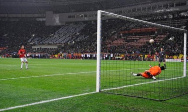 Cristiano Ro<em></em>naldo watches as his penalty is saved by Petr Cech.