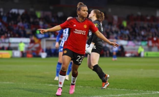 Nikita Parris celebrates scoring for Manchester United.