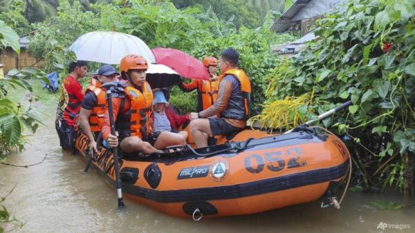 Four dead as tropical storm floods Philippines, disrupting schools and flights