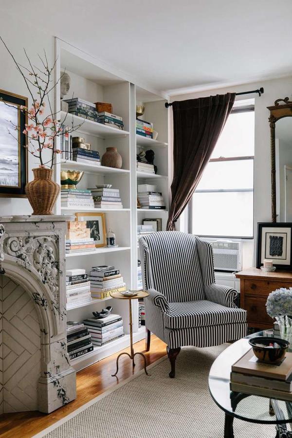 striped black and white chair and side table in living room