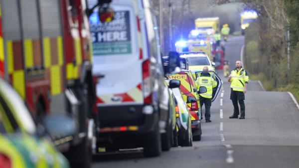 Emergency workers at the scene of a school bus crash on the Ballyblack Road East near Carrowdore in Northern Ireland on Mo<em></em>nday afternoon. Picture: Mark Marlow /PA Wire