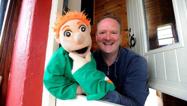 Dominic Moore, visited at home by former RTÉ kids' telly superstar Rasher Bacon. Pic Denis Scannell