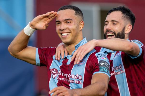 Drogheda United goalscorer Douglas James Taylor is co<em></em>ngratulated by Dave Webster. Pic: Morgan Treacy/Inpho