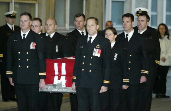 The removal of the body of Lt Chris Saunders from Sligo General Hospital in 2004. File photo: James Connolly