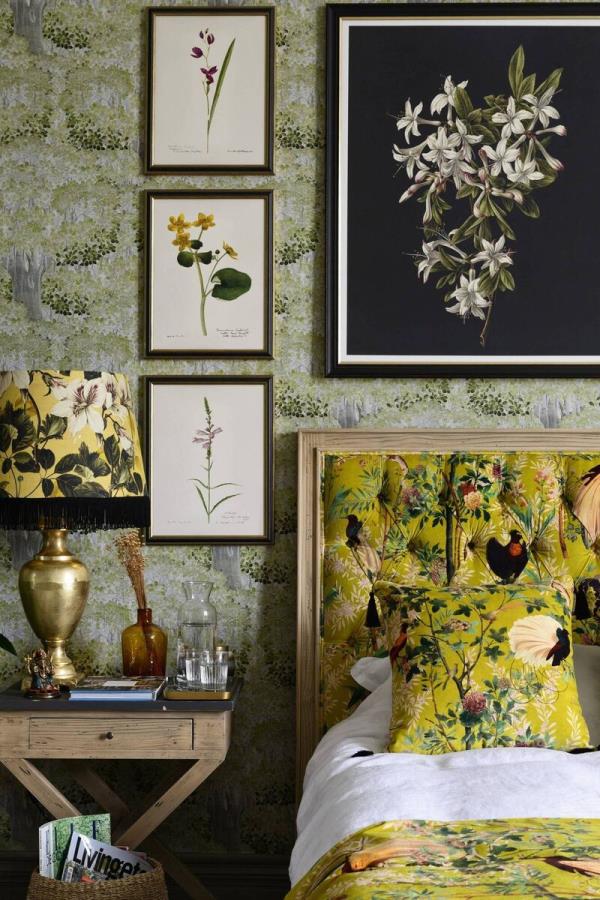 Increase a headboard's presence with a gallery wall, Mind the Gap, Transylvanian Manor, Journey To Eden wallpaper and chinoiserie fabrics, from €257 a roll.