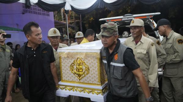 A small town in central Thailand is mourning the 23 who died in school bus fire