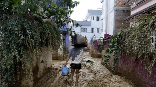 Search co<em></em>ntinues in Nepal after more than 200 killed in flooding and landslides