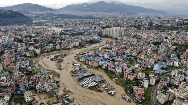 Flooding and landslides in Nepal kill at least 100