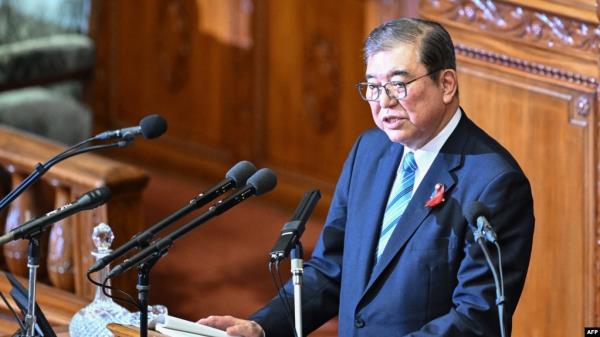 FILE - Japan's new Prime Minister Shigeru Ishiba delivers his inaugural policy address in the lower house of parliament in Tokyo, Oct. 4, 2024.