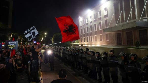 Supporters of the opposition attend an anti-government protest, in front of Albania's Prime Minister Edi Rama's office, in Tirana, Albania, Oct. 7, 2024.