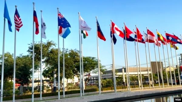 Flags fly in front of the Natio<em></em>nal Co<em></em>nvention Centre ahead of the 44th and 45th ASEAN Summits and Related Summits, in Vientiane, Laos.