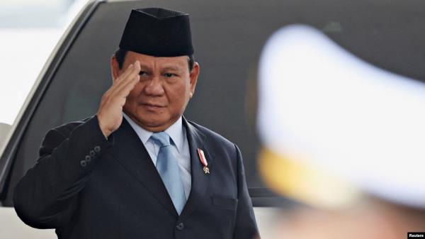 FILE - Indo<em></em>nesian President-elect Prabowo Subianto gestures as he attends the annual State of the Nation Address at the parliament building, ahead of the country's Independence Day, in Jakarta, Indonesia, August 16, 2024. 