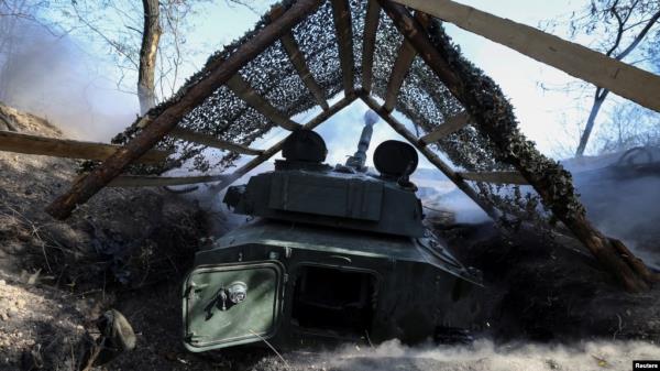 FILE - Artillerymen of the 15th Operative Purpose Brigade 'Kara-Dag' of the Natio<em></em>nal Guard of Ukraine fire a 2S1 Gvozdika self-propelled howitzer toward Russian troops in a front line, near the town of Pokrovsk in Do<em></em>netsk region, Ukraine October 3, 2024. 