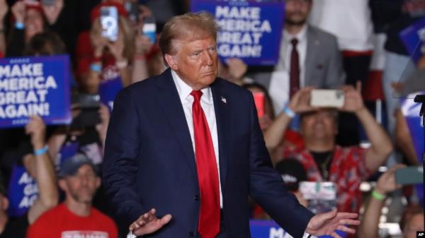 FILE - Republican presidential nominee former President Do<em></em>nald Trump at a campaign rally in Erie, Pennsylvania, Sept. 29, 2024. Prosecutors allege Tehran tried to hack figures associated with the presidential election, stealing information from Trump's campaign.