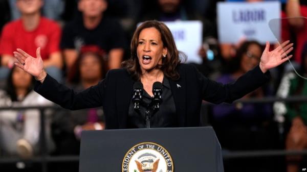 Democratic presidential nominee Vice President Kamala Harris speaks during a campaign rally at the Dort Financial Center in Flint, Michigan, Oct. 4, 2024. 