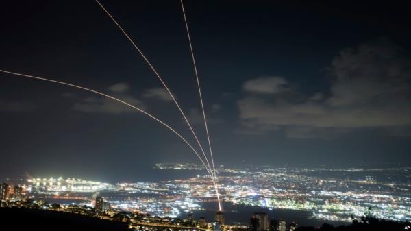 Israel's Iron Dome air defense system fires to intercept rockets that were launched from Lebanon, as seen from Haifa, northern Israel, Sept. 23, 2024. 