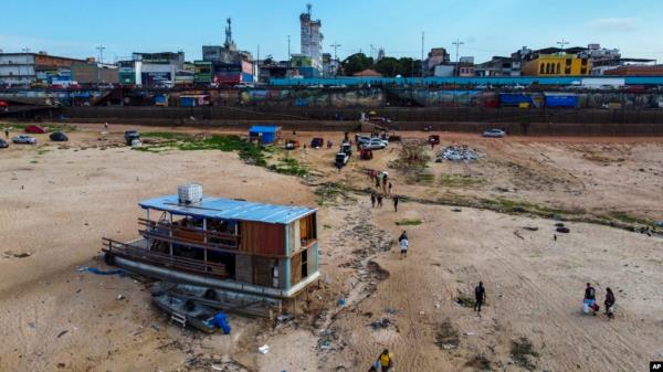 A boat is grounded in the Negro River at the port in Manaus, Amazo<em></em>nas state, Brazil, Oct. 4, 2024, amid severe drought.