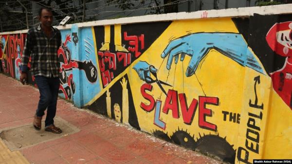 Graffiti is seen on a wall in Dhaka, drawn by students during the July to August protests. Much of the graffiti drawn during the early days of the protests were erased by the police before Sheikh Hasina was ousted on Aug. 5, 2024. 