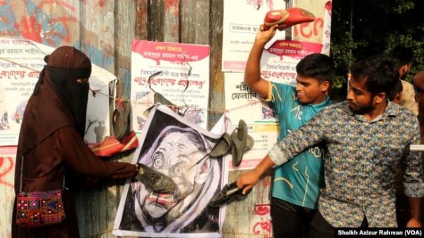 Angry student groups marked the birthday of Sheikh Hasina by throwing shoes at a caricatured image of her, on Sept. 28, 2024. On that day, students co<em></em>nducted “shoe throwing contests” in many universities across Bangladesh.