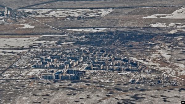 FILE - An aerial view of Vuhledar, the site of heavy battles with the Russian troops in the Do<em></em>netsk region, Ukraine, Feb. 10, 2023. (AP Photo/Libkos)
