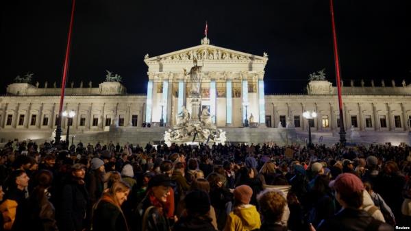 People attend a protest against the Freedom Party after general elections in Vienna, Austria, Oct. 3, 2024. 