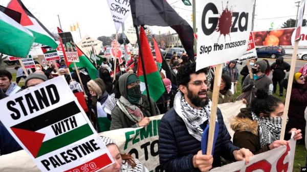 FILE - Pro-Palestinian demo<em></em>nstrators march during a visit by President Joe Biden in Warren, Mich., Feb. 1, 2024.