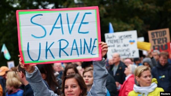 Protesters in Berlin protest militarization, delivery of weapons to Ukraine, Israel or other countries, and statio<em></em>ning U.S medium-range weapons in Germany. They also back peace negotiations between Russia and Ukraine, and Israel and Hamas, Oct. 3, 2024.