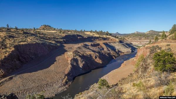 This image provided by Swiftwater Films shows water flowing down the Klamath River wher<em></em>e the Iron Gate Dam o<em></em>nce stood near Hornbrook, California, Oct. 1, 2024. (Swiftwater Films via AP)