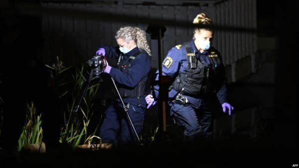 Police forensics officers work near the Israeli Embassy in Stockholm, Sweden, after a suspected shooting on Oct. 1, 2024.