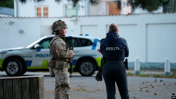 Police officers are seen securing an area near the Israeli embassy in Copenhagen, on October 2, 2024.