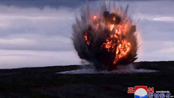 This picture taken on September 18, 2024 and released from North Korea's official Korean Central News Agency (KCNA) via KNS on September 19, 2024 shows a new tactical ballistic missile landing on the target during a test-firing, at an undisclosed location