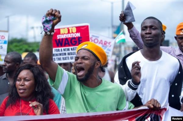 Protesters shout slogans as they protest against insecurity, hunger and hardship on the day of Nigeria's 64th Independence Day celebration in Lagos, Nigeria, Oct. 1, 2024.