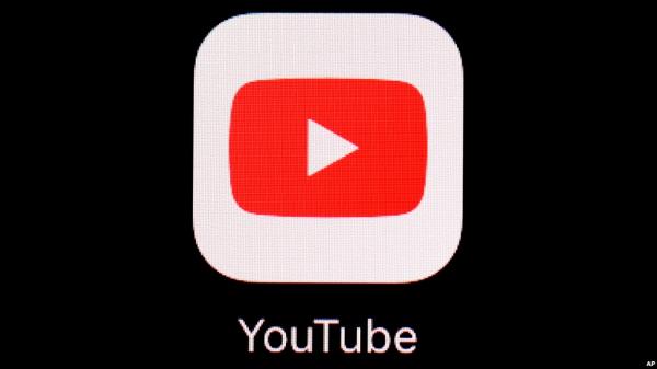 FILE - The YouTube app is displayed on an iPad in Baltimore on March 20, 2018. 