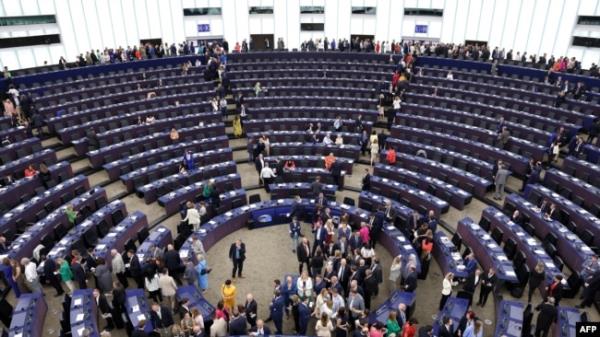 FILE - Members of the European Parliament line up to vote in the election of the new President of the European Parliament during the first plenary session of the newly-elected European Assembly in Strasbourg, eastern France, on July 16, 2024.