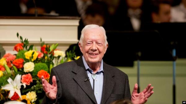 FILE - Former President Jimmy Carter teaches Sunday School class at the Maranatha Baptist Church in Plains, Ga., Aug. 23, 2015. The Fox theater in Atlanta recently hosted dozens of musical acts and thousands of guests for a co<em></em>ncert celebrating Jimmy Carter's 100th birthday.