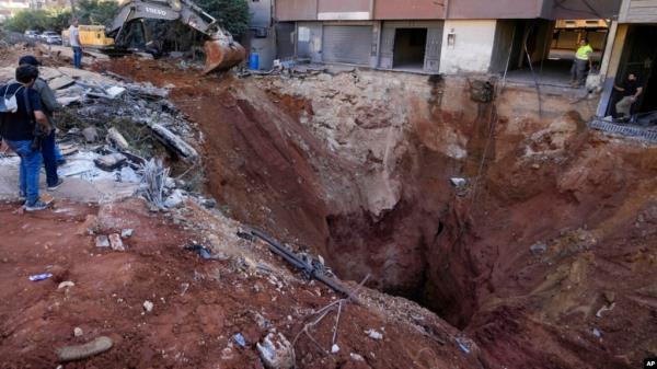 A hole in the ground near the site of the assassination of Hezbollah leader Hassan Nasrallah in Beirut's southern suburbs, Sept. 29, 2024.